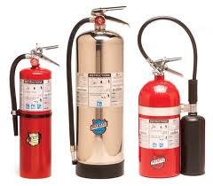 3 types of fire extinguishers side by side on white background